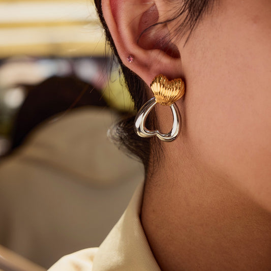 Two-tone heart stud earrings