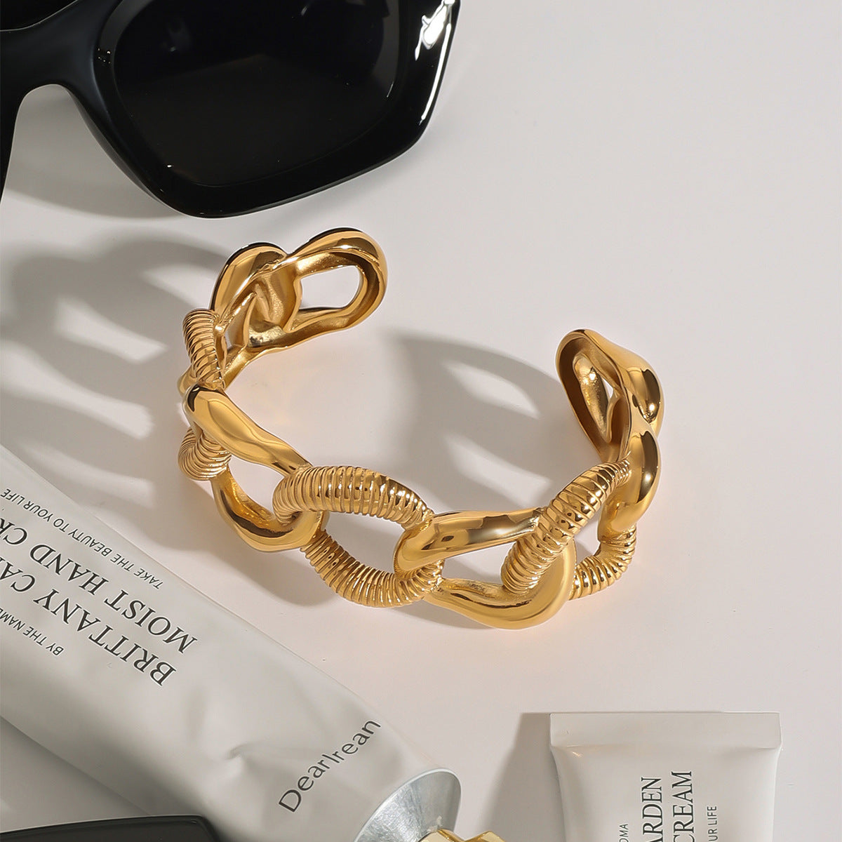 Stainless steel 18k gold-plated open-ended bracelet