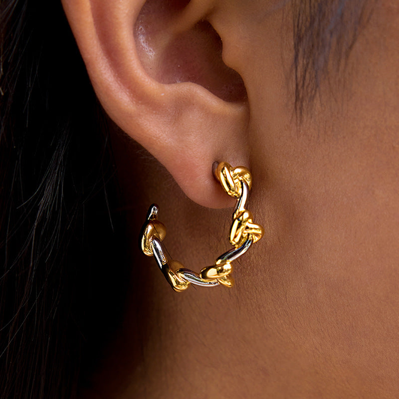 Titanium steel knot earrings