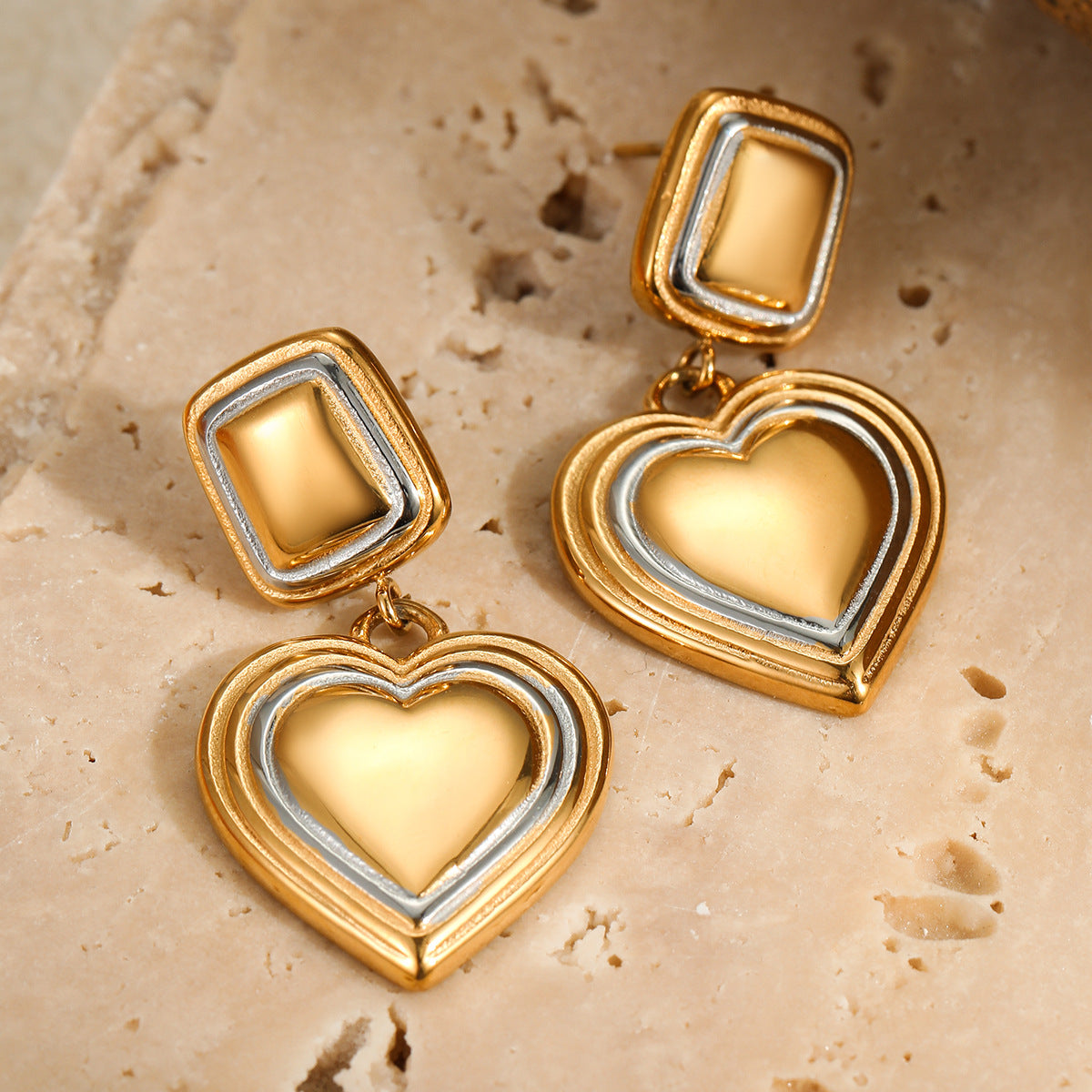 Two-tone heart earrings