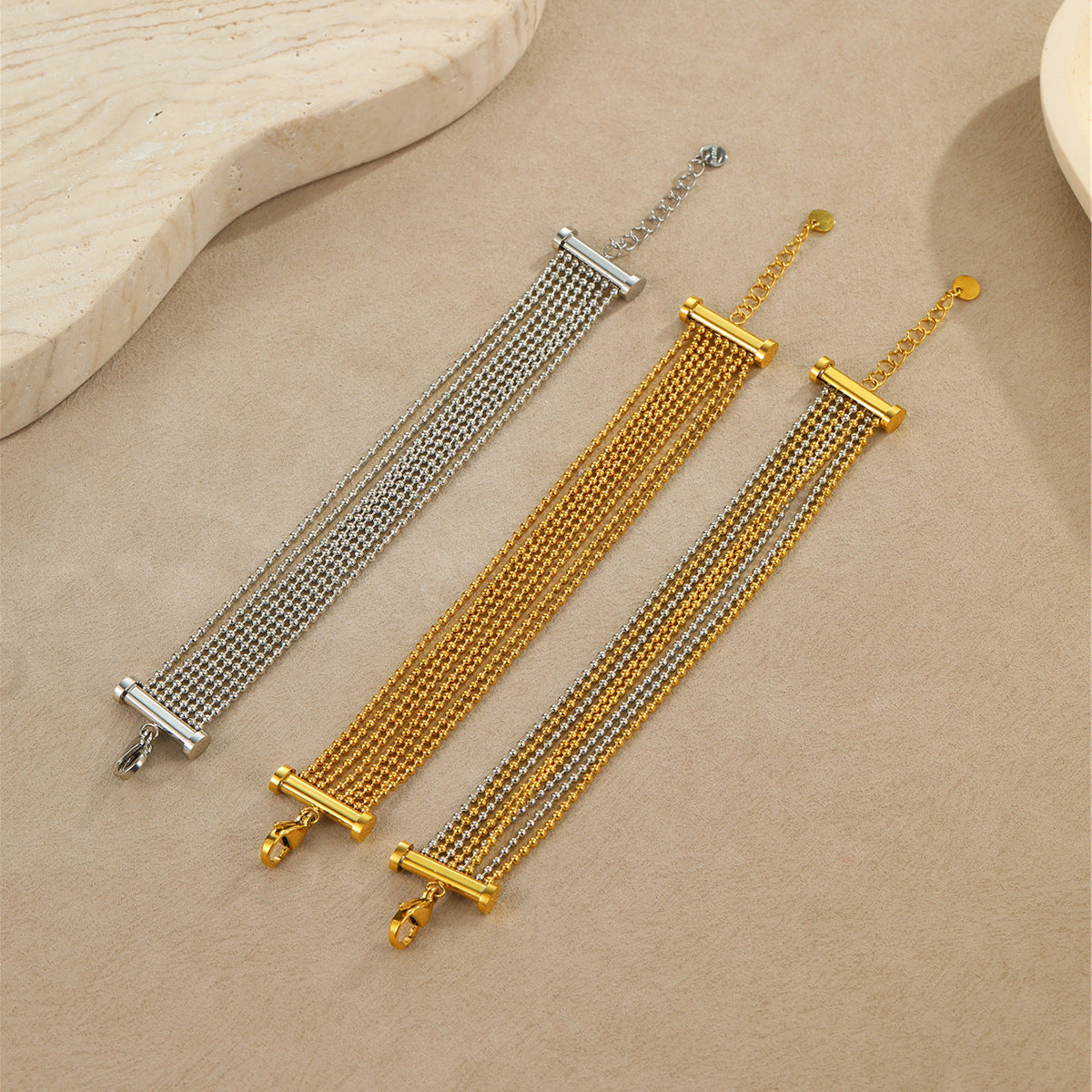 Layered stainless steel tassel bracelet