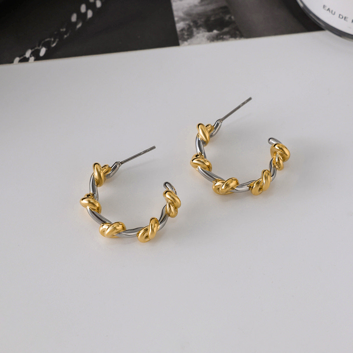 Titanium steel knot earrings