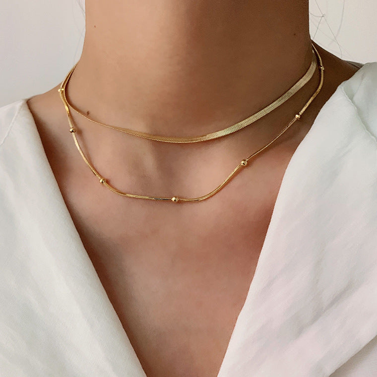 Stainless steel 14k gold-plated round bead necklace