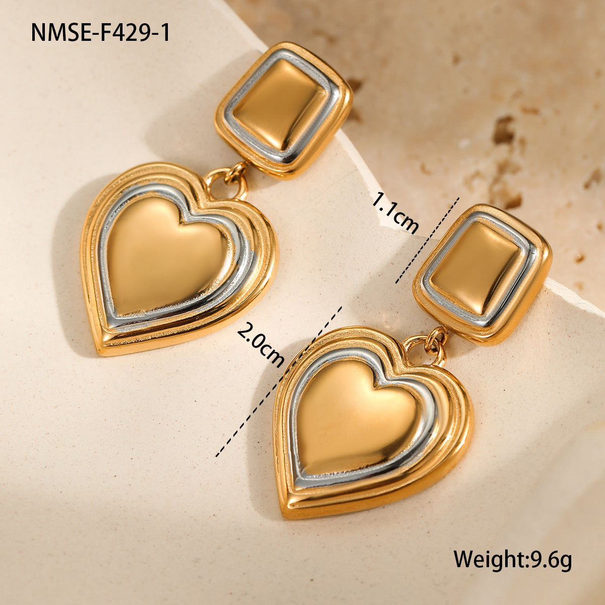 Two-tone heart earrings